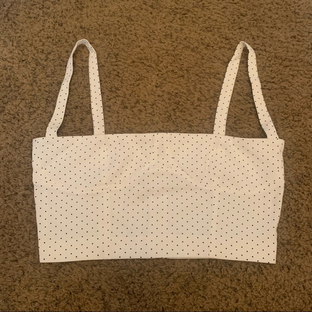 White polka dot crop top with zipper closure